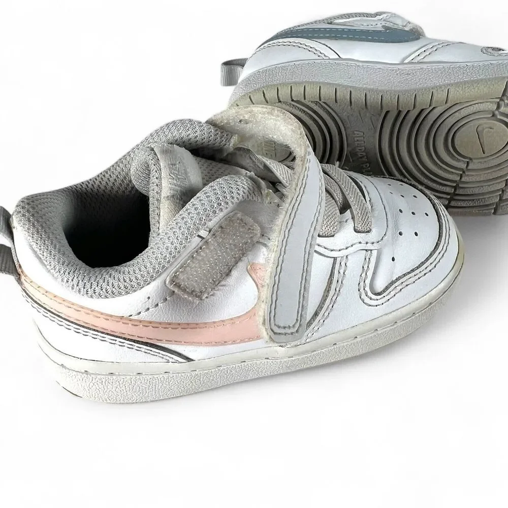 Nike Kids White Sneakers with Blue and Pink Swooshes